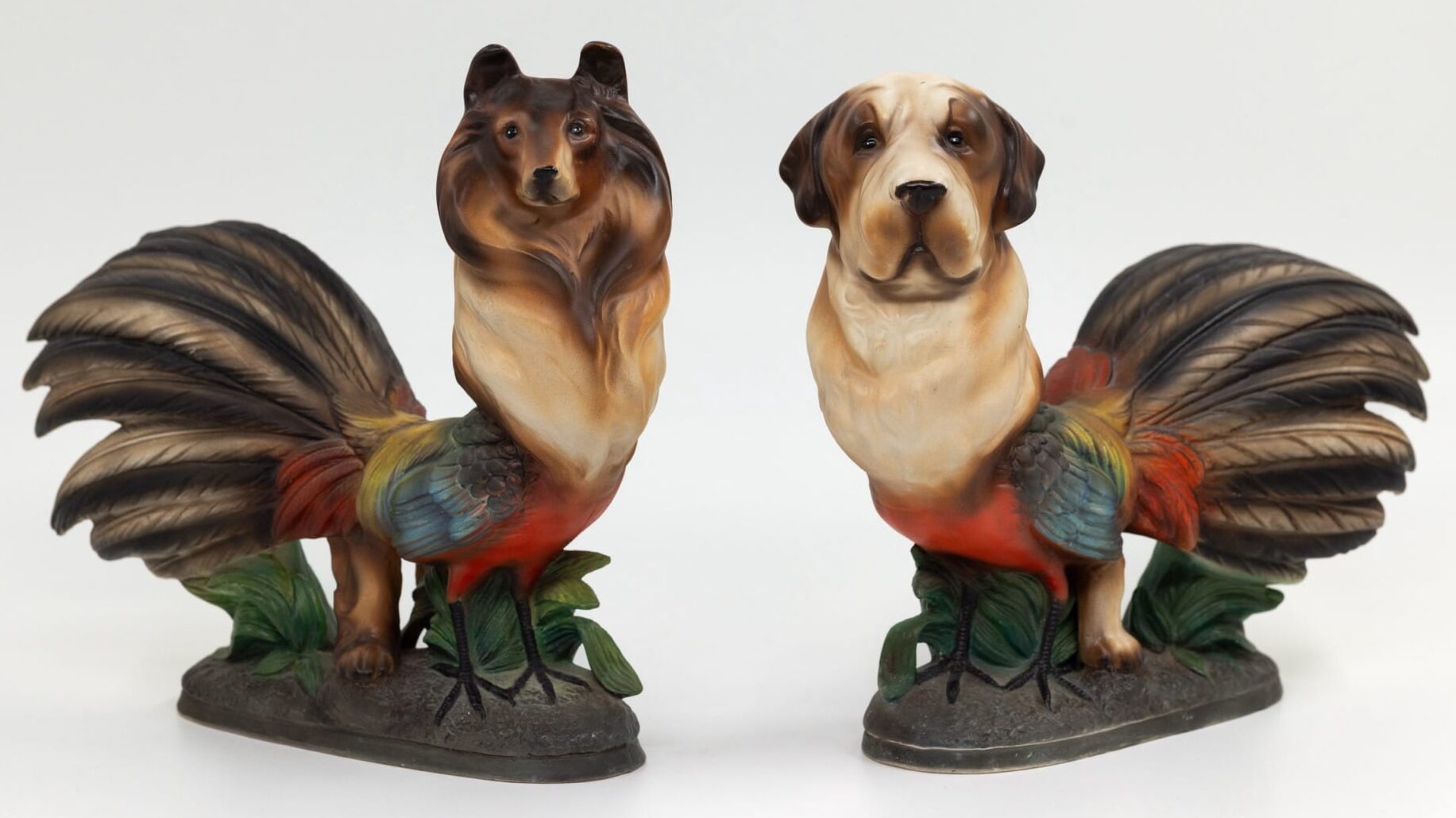 two small sculptures made from secondhand ceramics showing pheasants with dog heads