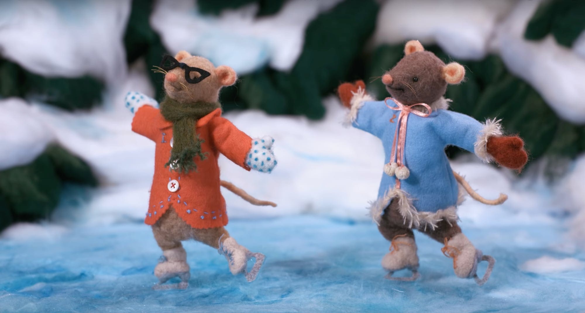 a still from a stop-motion animation of two felted mice ice skating