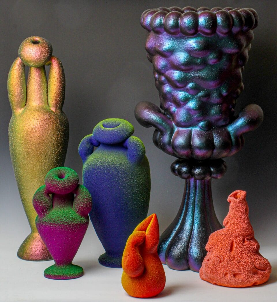 a group of seemingly glowing or fluorescing vase sculptures in different colors and globular shapes