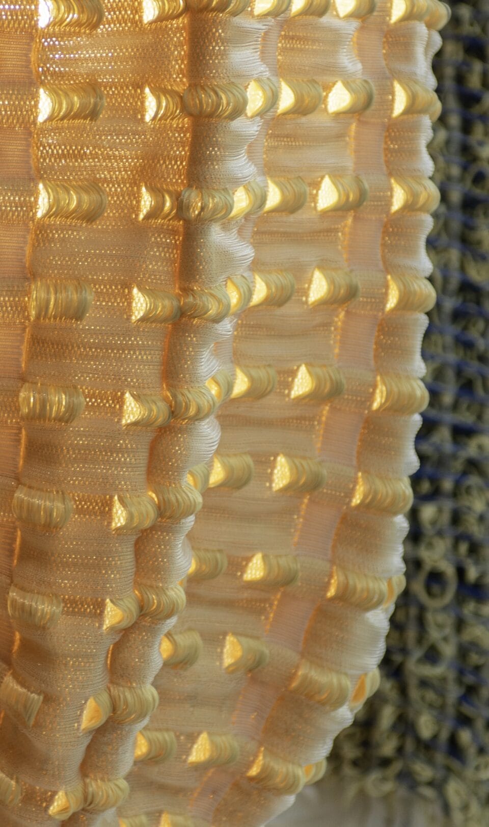 a detail of yellow woven fabric